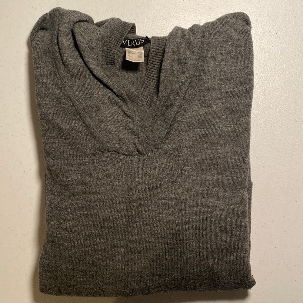 Thin sweater with a hood